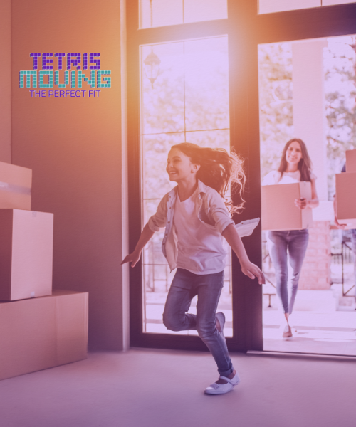 A kid running into a new house with moving boxes littered around the room