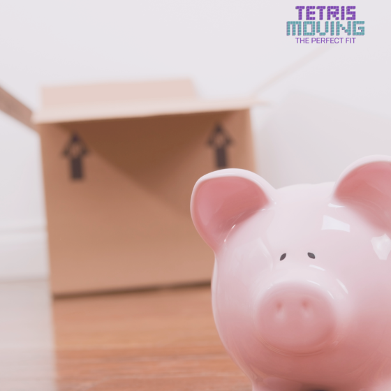 piggy bank in the foreground and a packing box in the background